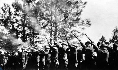 Book caption: 'George Carr, E.E. (Doc) Grannis, Joe Burkland, Russel Bjorn, and Ted Bjorn are all in this photo, although none is {sic} identified.'