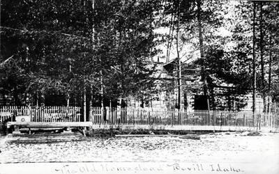 A copy of a postcard picturing the Warren cabin, in Bovill, Idaho.