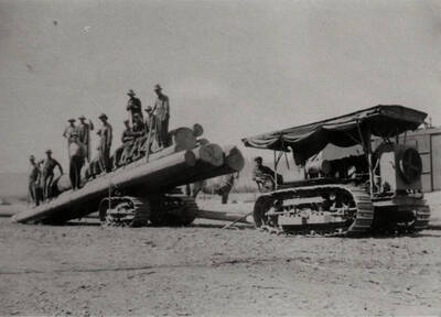 A crew using caterpillar logging equipment