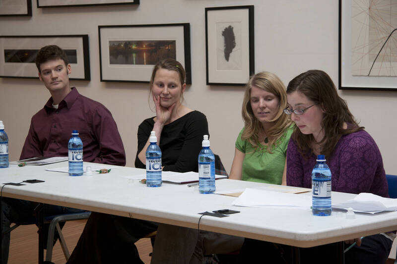 Photograph  6 of Brandon Schrand and MFA Creative Writing Students' Essay Reading 'The Unique and Universal in the Personal Essay: Graduate Student Readings.'  Brandon Schrand is an Assistant Professor of English. Pictured L to R: Aaron Poor, Jamaica Ritcher, Cara Stoddard, Ann Stebner Steele in University of Idaho Prichard Gallery.