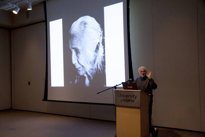 Photograph  9 of Bill Voxman's Colloquium Talk and Gallery Exhibition 'Communicating Communication through Black and White Photography: Connecting the Diverse with the Shared in Common.' Bill Voxman is Photographer and Professor Emeritus of Mathematics. Voxman's photographs were displayed in the UI Commons Reflections Gallery from January 9 to 27, 2012. Pictured: Bill Voxman.