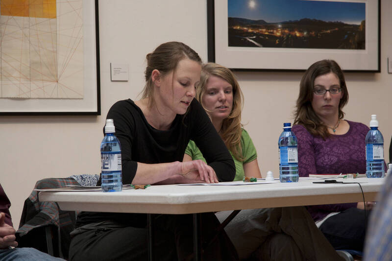 Photograph  10 of Brandon Schrand and MFA Creative Writing Students' Essay Reading 'The Unique and Universal in the Personal Essay: Graduate Student Readings.'  Brandon Schrand is an Assistant Professor of English. Pictured L to R: Jamaica Ritcher, Cara Stoddard, Ann Stebner Steele in University of Idaho Prichard Gallery.