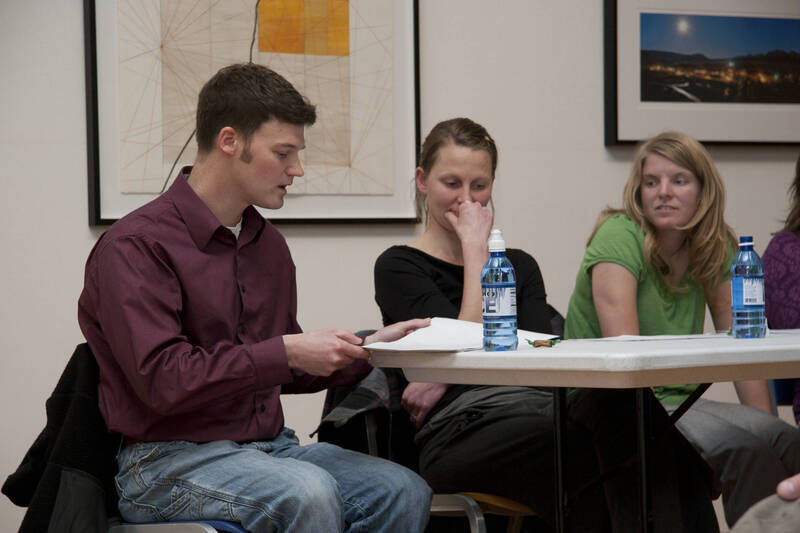 Photograph  11 of Brandon Schrand and MFA Creative Writing Students' Essay Reading 'The Unique and Universal in the Personal Essay: Graduate Student Readings.'  Brandon Schrand is an Assistant Professor of English. Pictured L to R: Aaron Poor, Jamaica Ritcher, Cara Stoddard, in University of Idaho Prichard Gallery.
