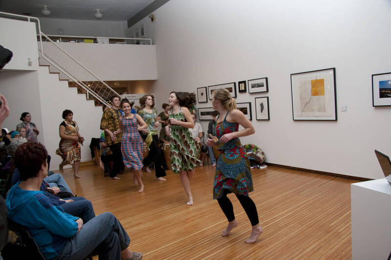 Photograph  4 of Barry Bilderback's Workshop and Performance 'Akwaaba and the Organization of Traditional Music and Dance in Ghanaian Culture.' Barry Bilderback is Assistant Professor of Music. Navin Chettri and World Beat were partners for the performance. Pictured: Performers at UI Prichard Gallery.