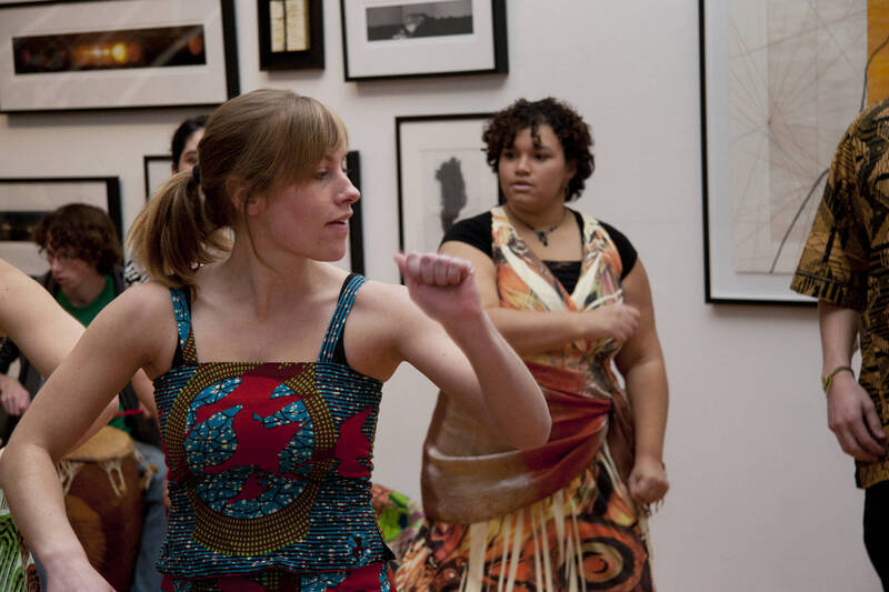Photograph  6 of Barry Bilderback's Workshop and Performance 'Akwaaba and the Organization of Traditional Music and Dance in Ghanaian Culture.' Barry Bilderback is Assistant Professor of Music. Navin Chettri and World Beat were partners for the performance. Pictured: Performers at UI Prichard Gallery.