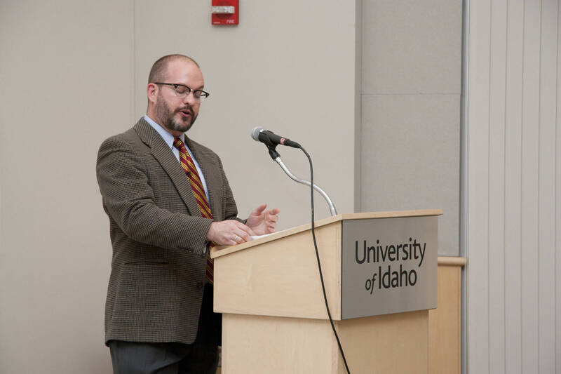 Photograph  5 of Garth Reese's Colloquium Talk 'Invisible Spokes: The Ubiquity of Magic in the West.'  Garth Reese is an Associate Professor and Head  of the Library's Special Collections and Archives. His research focus is Religious Studies. Pictured: Garth Reese.