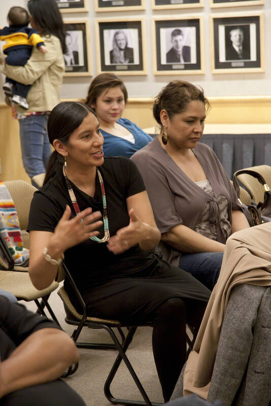 Photograph  14 of Moderator Janis Johnson with Loretta Halfmoon, Shirley McCormack, and Silas Whitman (descendents of Nez Perce musicians)'s Discussion 'A Discussion with Nez Perce Jazz Musicians.' Janis Johnson is Assistant Professor of English. Pictured: Audience member Angel Sobotta, Nez Perce Tribe member.