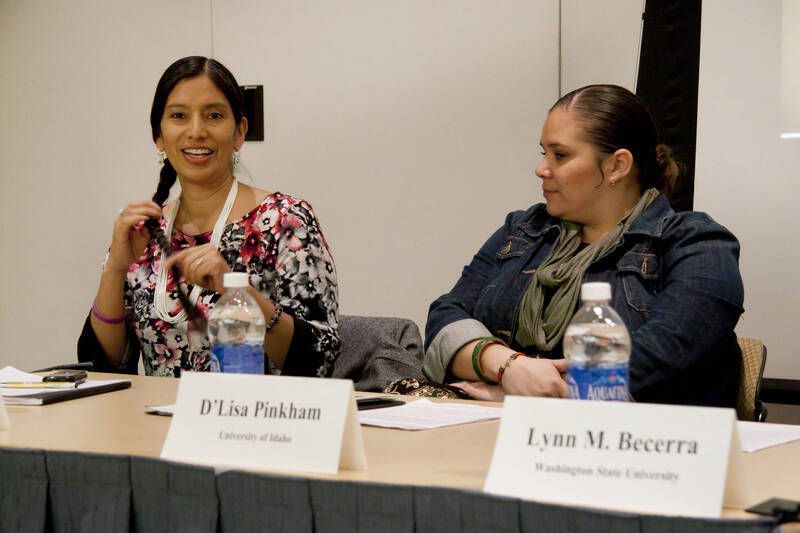 Photograph  2 of Georgia Johnson and graduate students Angel Sobotta, D'Lisa Pinkham, Lynn M. Becerra, Maria Isabel Morales, and Renee Holt's Panel Presentation 'Turning of the Wheel: an Indigenous Woman's Perspective.' Panelists are from Georgia Johnson (Associate Professor of Education)'s 'Indigenous Knowledge and Research Models in Education' course. Pictured L to R: Angel Sobotta (UI) and D'Lisa Pinkham (UI).