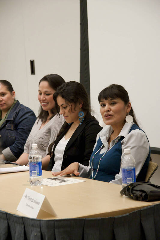 Photograph  19 of Georgia Johnson and graduate students Angel Sobotta, D'Lisa Pinkham, Lynn M. Becerra, Maria Isabel Morales, and Renee Holt's Panel Presentation 'Turning of the Wheel: an Indigenous Woman's Perspective.' Panelists are from Georgia Johnson (Associate Professor of Education)'s 'Indigenous Knowledge and Research Models in Education' course. Pictured L to R: Pinkham (UI), Becerra (WSU), Morales (WSU), and Holt (WSU).