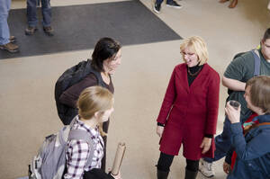 Photograph  11 of Sally Graves Machlis and Delphine Keim-Campbell's Colloquium Talk and Gallery Exhibition 'Road Stories.'  Sally Graves Machlis is Chair and Professor of Art and Design. Dephine Keim-Campbell is Associate Professor of Art and Design. Pictured: Keim-Campbell and Machlis at opening reception, Reflections Gallery, UI Commons.