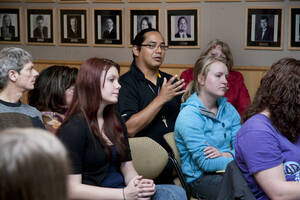 Photograph  13 of Janis Johnson's Colloquium Talk 'This Is the Sound of Survivance: Nez Perce Indians Playing Jazz.' Janis Johnson is Assistant Professor English. Pictured: Audience member Arthur Taylor, Native American Tribal Liaison to the Provost at UI, makes an oberservation after Johnson's talk.