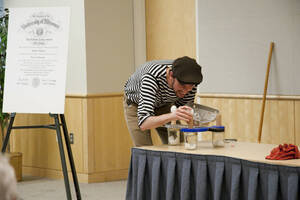 Photograph  22 of Dan Edwards's Colloquium Talk 'The Unique vs. The Universal: the Final Round.' Dan Edwards is Associate Professor of Physical Chemistry. Pictured: Student assistant to Dan Edwards.