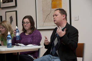 Photograph  2 of Brandon Schrand and MFA Creative Writing Students' Essay Reading 'The Unique and Universal in the Personal Essay: Graduate Student Readings.'  Brandon Schrand is an Assistant Professor of English. Pictured L to R: Cara Stoddard, Ann Stebner Steele, Brandon Schrand in University of Idaho Prichard Gallery.