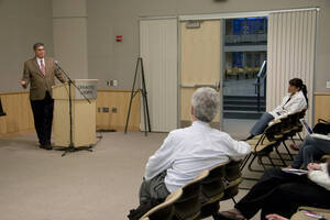 Photograph  7 of Mark Trahant's Colloquium Talk 'The full spectrum in a wheel: Less, more and the opposite spoke.' Mark Trahant is Editor-in-Residence for the School of Journalism and Mass Media and a member of Idaho's Shoshone-Bannock Tribe. Pictured: Mark Trahant talks with audience.