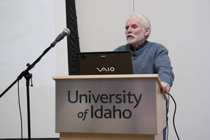 Photograph  2 of Bill Voxman's Colloquium Talk and Gallery Exhibition 'Communicating Communication through Black and White Photography: Connecting the Diverse with the Shared in Common.' Bill Voxman is Photographer and Professor Emeritus of Mathematics. Voxman's photographs were displayed in the UI Commons Reflections Gallery from January 9 to 27, 2012. Pictured: Bill Voxman.