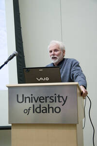 Photograph  3 of Bill Voxman's Colloquium Talk and Gallery Exhibition 'Communicating Communication through Black and White Photography: Connecting the Diverse with the Shared in Common.' Bill Voxman is Photographer and Professor Emeritus of Mathematics. Voxman's photographs were displayed in the UI Commons Reflections Gallery from January 9 to 27, 2012. Pictured: Bill Voxman.