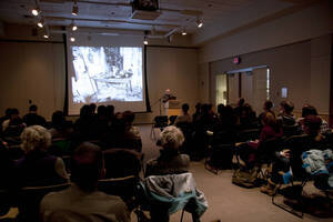 Photograph  5 of Bill Voxman's Colloquium Talk and Gallery Exhibition 'Communicating Communication through Black and White Photography: Connecting the Diverse with the Shared in Common.' Bill Voxman is Photographer and Professor Emeritus of Mathematics. Voxman's photographs were displayed in the UI Commons Reflections Gallery from January 9 to 27, 2012. Pictured: Bill Voxman.