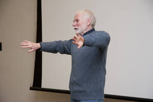 Photograph  11 of Bill Voxman's Colloquium Talk and Gallery Exhibition 'Communicating Communication through Black and White Photography: Connecting the Diverse with the Shared in Common.' Bill Voxman is Photographer and Professor Emeritus of Mathematics. Voxman's photographs were displayed in the UI Commons Reflections Gallery from January 9 to 27, 2012. Pictured: Bill Voxman.