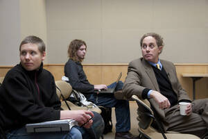 Photograph  1 of David Adler's Colloquium Talk 'Governing in an Era of Crisis: The Rule of Law and Emergency Powers.' David Adler is James A. McClure Professor and Director, McClure Center for Public Policy Research. Pictured: Audience members and David Adler (far right) listen as Adler's talk is introduced.