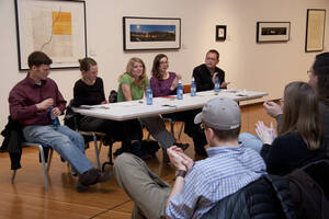 Photograph  9 of Brandon Schrand and MFA Creative Writing Students' Essay Reading 'The Unique and Universal in the Personal Essay: Graduate Student Readings.'  Brandon Schrand is an Assistant Professor of English. Pictured L to R: Aaron Poor, Jamaica Ritcher, Cara Stoddard, Ann Stebner Steele, Brandon Schrand, and audience in University of Idaho Prichard Gallery.