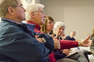Photograph 12 of Stephen Drown's Colloquium Talk 'The University of Idaho Olmsted Brothers' Master Plan: Historical Process and the Creation of Place.' Stephen Drown is Chair and Professor of Landscape Architecture. Pictured: Audience members pose questions to Stephen Drown.