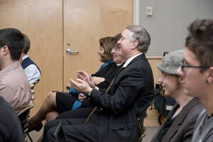 Photograph  7 of Marty Peterson's Colloquium Talk 'Reflections on Serving under Seven University of Idaho Presidents - Representing the University in all its Diversity and Universality.' Marty Peterson is Special Assistant to the President, Governmental Relations. Pictured: UI President M. Duane Nellis applauds after Marty Peterson's talk.