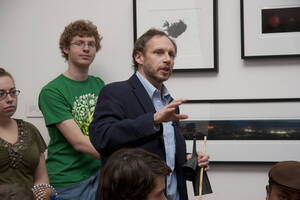 Photograph  3 of Barry Bilderback's Workshop and Performance 'Akwaaba and the Organization of Traditional Music and Dance in Ghanaian Culture.' Barry Bilderback is Assistant Professor of Music. Navin Chettri and World Beat were partners for the performance. Pictured: Barry Bilderback and performers at UI Prichard Gallery.