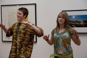 Photograph  5 of Barry Bilderback's Workshop and Performance 'Akwaaba and the Organization of Traditional Music and Dance in Ghanaian Culture.' Barry Bilderback is Assistant Professor of Music. Navin Chettri and World Beat were partners for the performance. Pictured: Performers at UI Prichard Gallery.