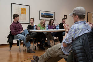 Photograph  12 of Brandon Schrand and MFA Creative Writing Students' Essay Reading 'The Unique and Universal in the Personal Essay: Graduate Student Readings.'  Brandon Schrand is an Assistant Professor of English. Pictured L to R: Aaron Poor, Jamaica Ritcher, Cara Stoddard, Ann Stebner Steele, Brandon Schrand, and audience in University of Idaho Prichard Gallery.