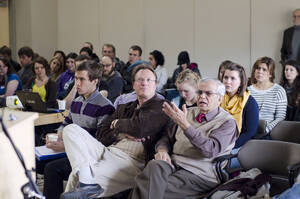 Photograph  12 of Bill Smith's Colloquium Talk 'The International Community Looks for...Community?.' Bill Smith is Director, Martin Institute and International Studies. Pictured: Audience members ask questions after Bill Smith's talk.