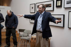 Photograph  21 of Barry Bilderback's Workshop and Performance 'Akwaaba and the Organization of Traditional Music and Dance in Ghanaian Culture.' Barry Bilderback is Assistant Professor of Music. Navin Chettri and World Beat were partners for the performance. Pictured: Barry Bilderback at UI Prichard Gallery.