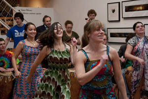 Photograph  7 of Barry Bilderback's Workshop and Performance 'Akwaaba and the Organization of Traditional Music and Dance in Ghanaian Culture.' Barry Bilderback is Assistant Professor of Music. Navin Chettri and World Beat were partners for the performance. Pictured: Barry Bilderback and performers at UI Prichard Gallery.