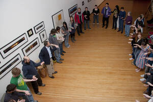 Photograph  24 of Barry Bilderback's Workshop and Performance 'Akwaaba and the Organization of Traditional Music and Dance in Ghanaian Culture.' Barry Bilderback is Assistant Professor of Music. Navin Chettri and World Beat were partners for the performance. Pictured: Barry Bilderback and audience participants at UI Prichard Gallery.