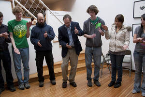Photograph  28 of Barry Bilderback's Workshop and Performance 'Akwaaba and the Organization of Traditional Music and Dance in Ghanaian Culture.' Barry Bilderback is Assistant Professor of Music. Navin Chettri and World Beat were partners for the performance. Pictured: Barry Bilderback and audience participants at UI Prichard Gallery.