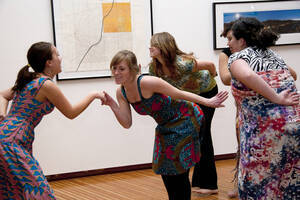 Photograph  8 of Barry Bilderback's Workshop and Performance 'Akwaaba and the Organization of Traditional Music and Dance in Ghanaian Culture.' Barry Bilderback is Assistant Professor of Music. Navin Chettri and World Beat were partners for the performance. Pictured: Performers at UI Prichard Gallery.
