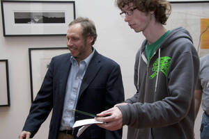 Photograph  33 of Barry Bilderback's Workshop and Performance 'Akwaaba and the Organization of Traditional Music and Dance in Ghanaian Culture.' Barry Bilderback is Assistant Professor of Music. Navin Chettri and World Beat were partners for the performance. Pictured: Barry Bilderback and audience participant at UI Prichard Gallery.