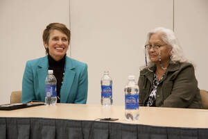 Photograph  11 of Moderator Janis Johnson with Loretta Halfmoon, Shirley McCormack, and Silas Whitman (descendents of Nez Perce musicians)'s Discussion 'A Discussion with Nez Perce Jazz Musicians.' Janis Johnson is Assistant Professor of English. Pictured L to R: Janis Johnson and Loretta Halfmoon .