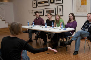 Photograph  16 of Brandon Schrand and MFA Creative Writing Students' Essay Reading 'The Unique and Universal in the Personal Essay: Graduate Student Readings.'  Brandon Schrand is an Assistant Professor of English. Pictured L to R: Aaron Poor, Jamaica Ritcher, Cara Stoddard, Ann Stebner Steele, Brandon Schrand, and audience in University of Idaho Prichard Gallery.
