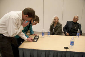 Photograph  15 of Moderator Janis Johnson with Loretta Halfmoon, Shirley McCormack, and Silas Whitman (descendents of Nez Perce musicians)'s Discussion 'A Discussion with Nez Perce Jazz Musicians.' Janis Johnson is Assistant Professor of English. Pictured L to R: Audience member, Janis Johnson, Loretta Halfmoon, and Silas Whitman.