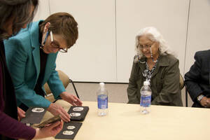 Photograph  16 of Moderator Janis Johnson with Loretta Halfmoon, Shirley McCormack, and Silas Whitman (descendents of Nez Perce musicians)'s Discussion 'A Discussion with Nez Perce Jazz Musicians.' Janis Johnson is Assistant Professor of English. Pictured L to R: Janis Johnson and Loretta Halfmoon .