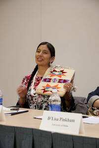 Photograph  3 of Georgia Johnson and graduate students Angel Sobotta, D'Lisa Pinkham, Lynn M. Becerra, Maria Isabel Morales, and Renee Holt's Panel Presentation 'Turning of the Wheel: an Indigenous Woman's Perspective.' Panelists are from Georgia Johnson (Associate Professor of Education)'s 'Indigenous Knowledge and Research Models in Education' course. Pictured: Angel Sobotta (UI).