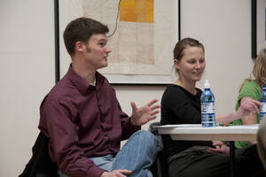 Photograph  18 of Brandon Schrand and MFA Creative Writing Students' Essay Reading 'The Unique and Universal in the Personal Essay: Graduate Student Readings.'  Brandon Schrand is an Assistant Professor of English. Pictured L to R: Aaron Poor, Jamaica Ritcher in University of Idaho Prichard Gallery.