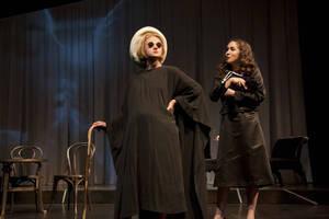 Photograph  5 of Robert Caisley and Lauren 'Lojo' Simon's Performance 'Adoration of Dora: a Play with Text and Images.' Robert Caisley, Associate Professor of Theatre Arts and Head of Dramatic Writing, directed the play. Lauren 'Lojo' Simon, MFA graduate student, wrote the play. Pictured: Cast members perform at dress rehearsal, University of Idaho Hartung Theater.