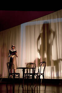 Photograph  9 of Robert Caisley and Lauren 'Lojo' Simon's Performance 'Adoration of Dora: a Play with Text and Images.' Robert Caisley, Associate Professor of Theatre Arts and Head of Dramatic Writing, directed the play. Lauren 'Lojo' Simon, MFA graduate student, wrote the play. Pictured: Cast members perform at dress rehearsal, University of Idaho Hartung Theater.