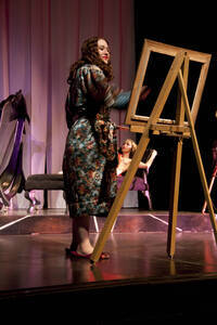 Photograph  18 of Robert Caisley and Lauren 'Lojo' Simon's Performance 'Adoration of Dora: a Play with Text and Images.' Robert Caisley, Associate Professor of Theatre Arts and Head of Dramatic Writing, directed the play. Lauren 'Lojo' Simon, MFA graduate student, wrote the play. Pictured: Cast members perform at dress rehearsal, University of Idaho Hartung Theater.