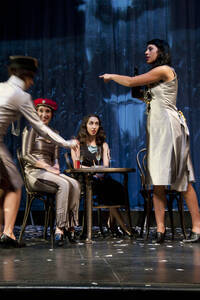 Photograph  30 of Robert Caisley and Lauren 'Lojo' Simon's Performance 'Adoration of Dora: a Play with Text and Images.' Robert Caisley, Associate Professor of Theatre Arts and Head of Dramatic Writing, directed the play. Lauren 'Lojo' Simon, MFA graduate student, wrote the play. Pictured: Cast members perform at dress rehearsal, University of Idaho Hartung Theater.