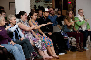 Photograph  16 of Barry Bilderback's Workshop and Performance 'Akwaaba and the Organization of Traditional Music and Dance in Ghanaian Culture.' Barry Bilderback is Assistant Professor of Music. Navin Chettri and World Beat were partners for the performance. Pictured: Performers and audience members at UI Prichard Gallery.