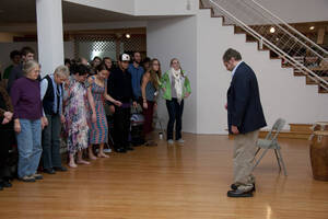 Photograph  18 of Barry Bilderback's Workshop and Performance 'Akwaaba and the Organization of Traditional Music and Dance in Ghanaian Culture.' Barry Bilderback is Assistant Professor of Music. Navin Chettri and World Beat were partners for the performance. Pictured: Barry Bilderback and audience at UI Prichard Gallery.