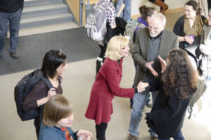 Photograph  14 of Sally Graves Machlis and Delphine Keim-Campbell's Colloquium Talk and Gallery Exhibition 'Road Stories.'  Sally Graves Machlis is Chair and Professor of Art and Design. Dephine Keim-Campbell is Associate Professor of Art and Design. Pictured L to R: Keim-Campbell, Machlis, Rodney Frey, Lojo Simon.