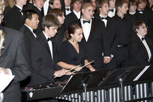 Photograph  5 of Dan Bukvich with Navin Chettri and the Jazz Choir I's Musical Performance 'The Village Sings and Drums and Dances, an evening of engaged voices and rhythms.' Dan Bukvich is Professor of Music. Navin Chettri is Bukvich's student. Pictured: Jazz Choir I, University of Idaho Prichard Gallery.